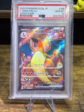A graded Pokémon Charizard SV2 2a JP trading card inside a clear PSA Gem Mint protective case, displayed on a stand over a wooden surface.